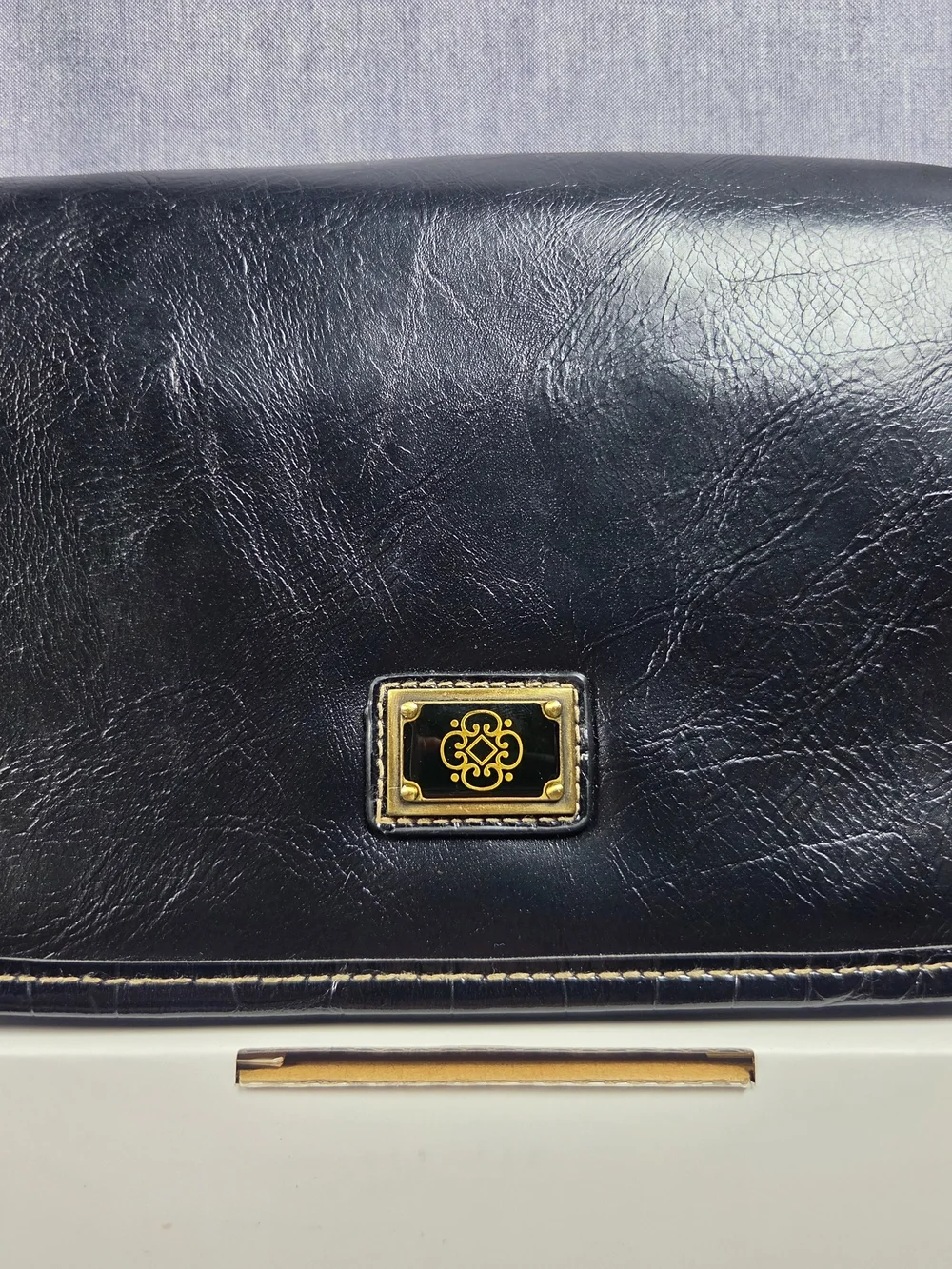 Black Leather Crossbody Shoulder Bag with Gold Accent